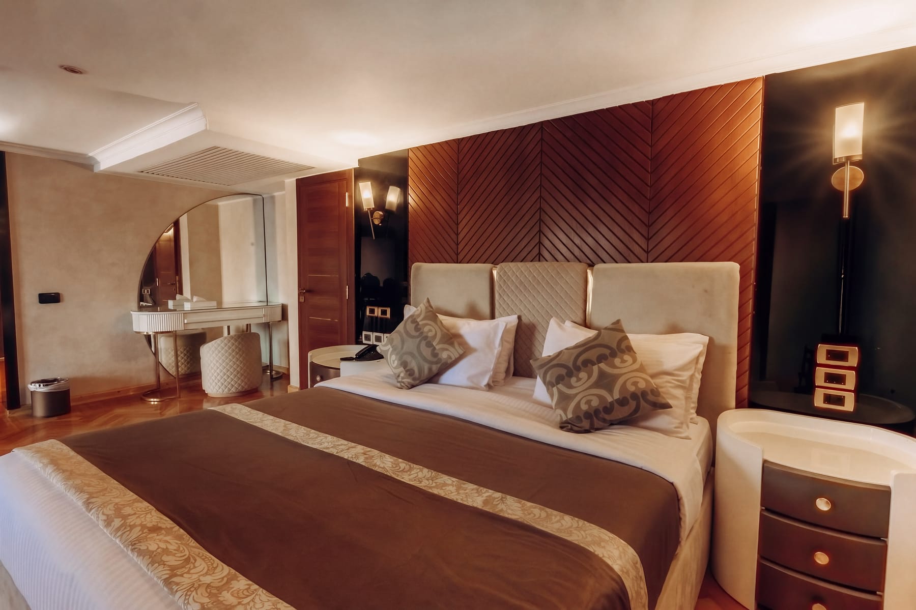 Junior Suite king bed and vanity, M/S City and Sea Adonis